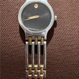 Movado Black Dial Watch with Silver and Gold Accents,